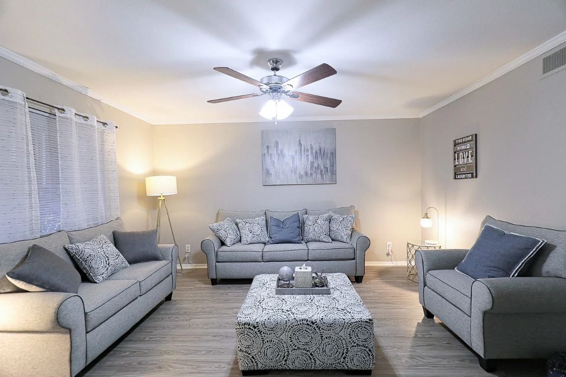 8100 North Mopac Expressway, Unit 5122 Austin, TX 78759 - Photo 12 of 28 a living room with furniture and a large window