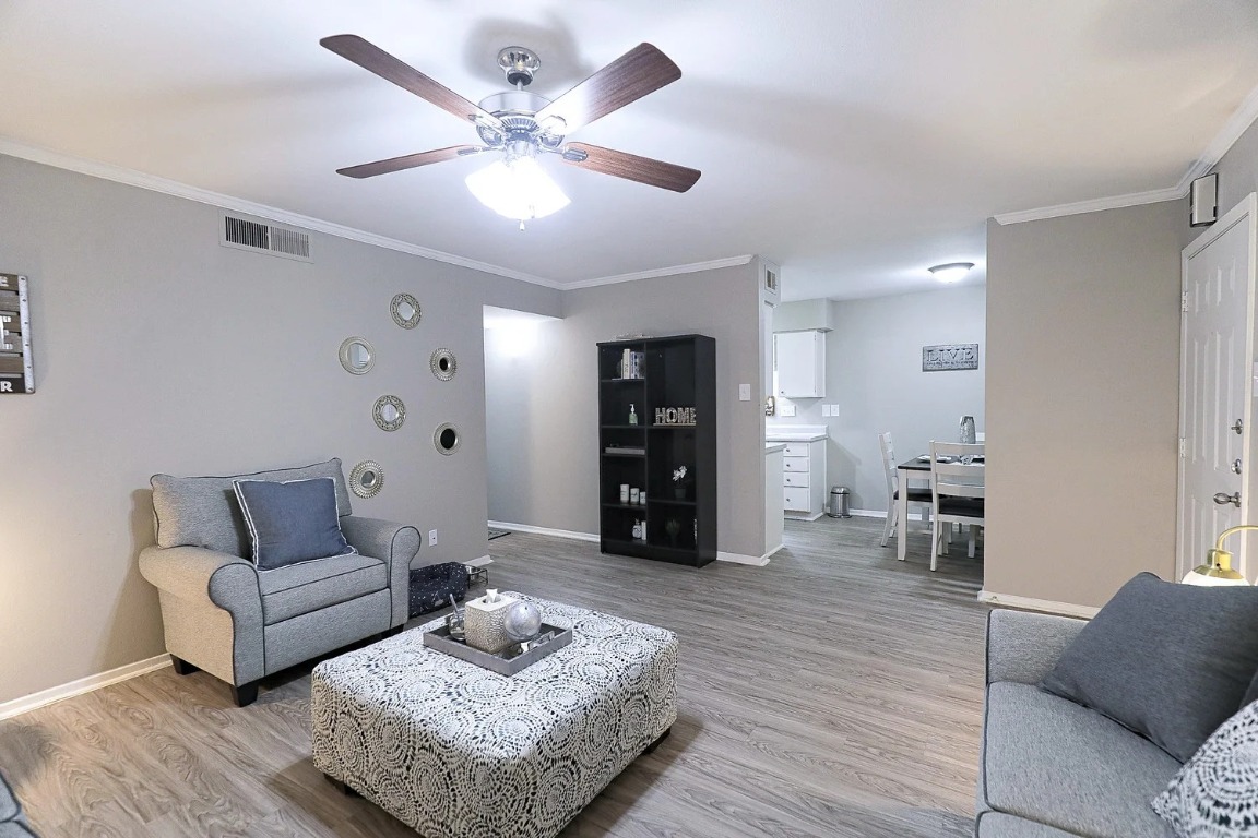 8100 North Mopac Expressway, Unit 5122 Austin, TX 78759 - Photo 13 of 28 a living room with furniture and wooden floor