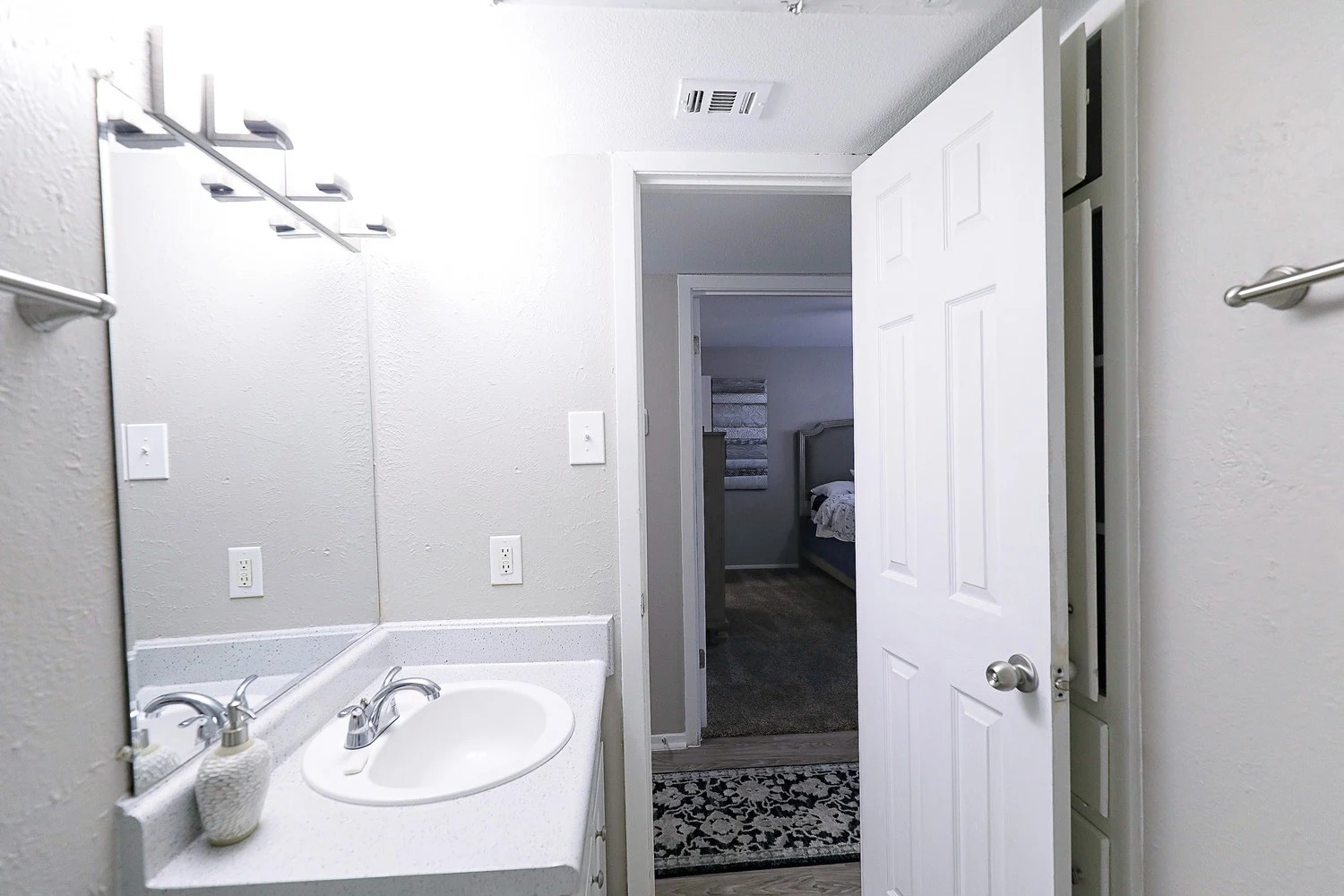 8100 North Mopac Expressway, Unit 5122 Austin, TX 78759 - Photo 20 of 28 a bathroom with a sink and a mirror
