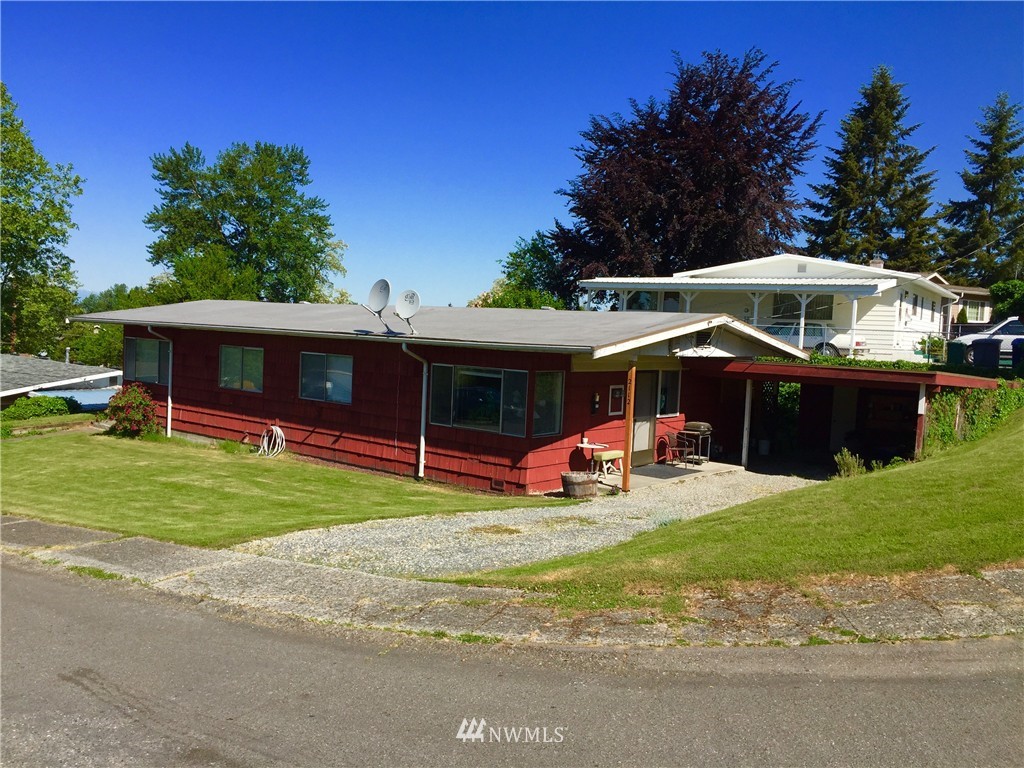 2110 Northeast 8th Street Renton, WA 98056 - Photo 1 of 2 a view of a house with a yard and sitting area