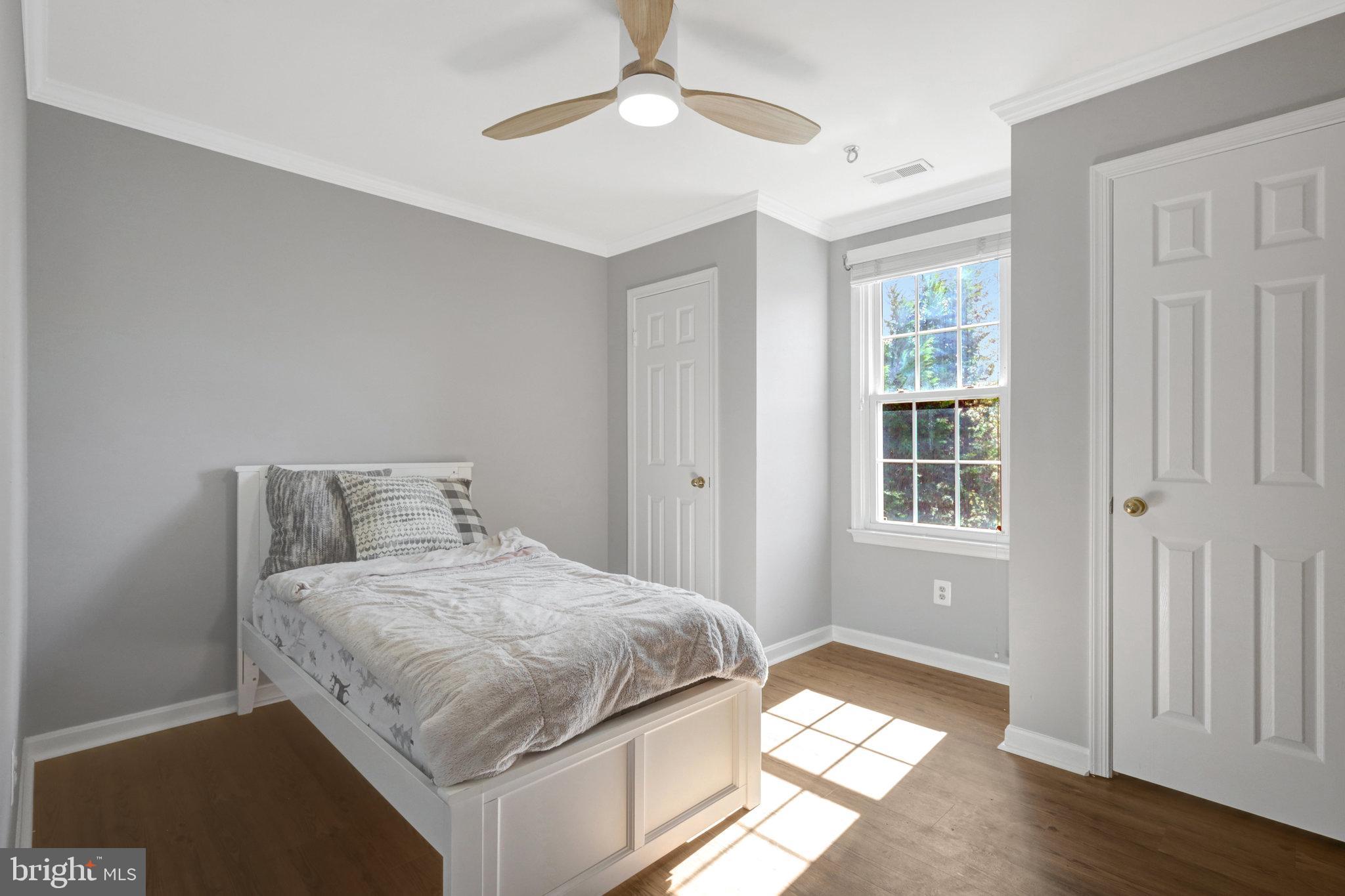 8497 Silverview Drive Lorton, VA 22079 - Photo 27 of 50 a bedroom with a bed and a window