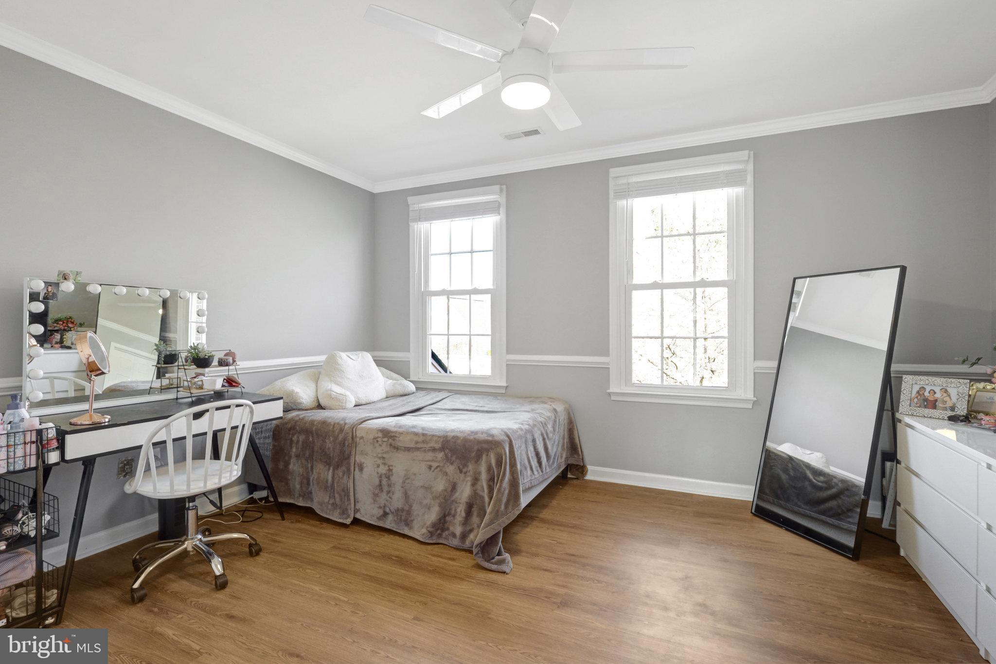 8497 Silverview Drive Lorton, VA 22079 - Photo 28 of 50 a bedroom with a bed furniture and a window