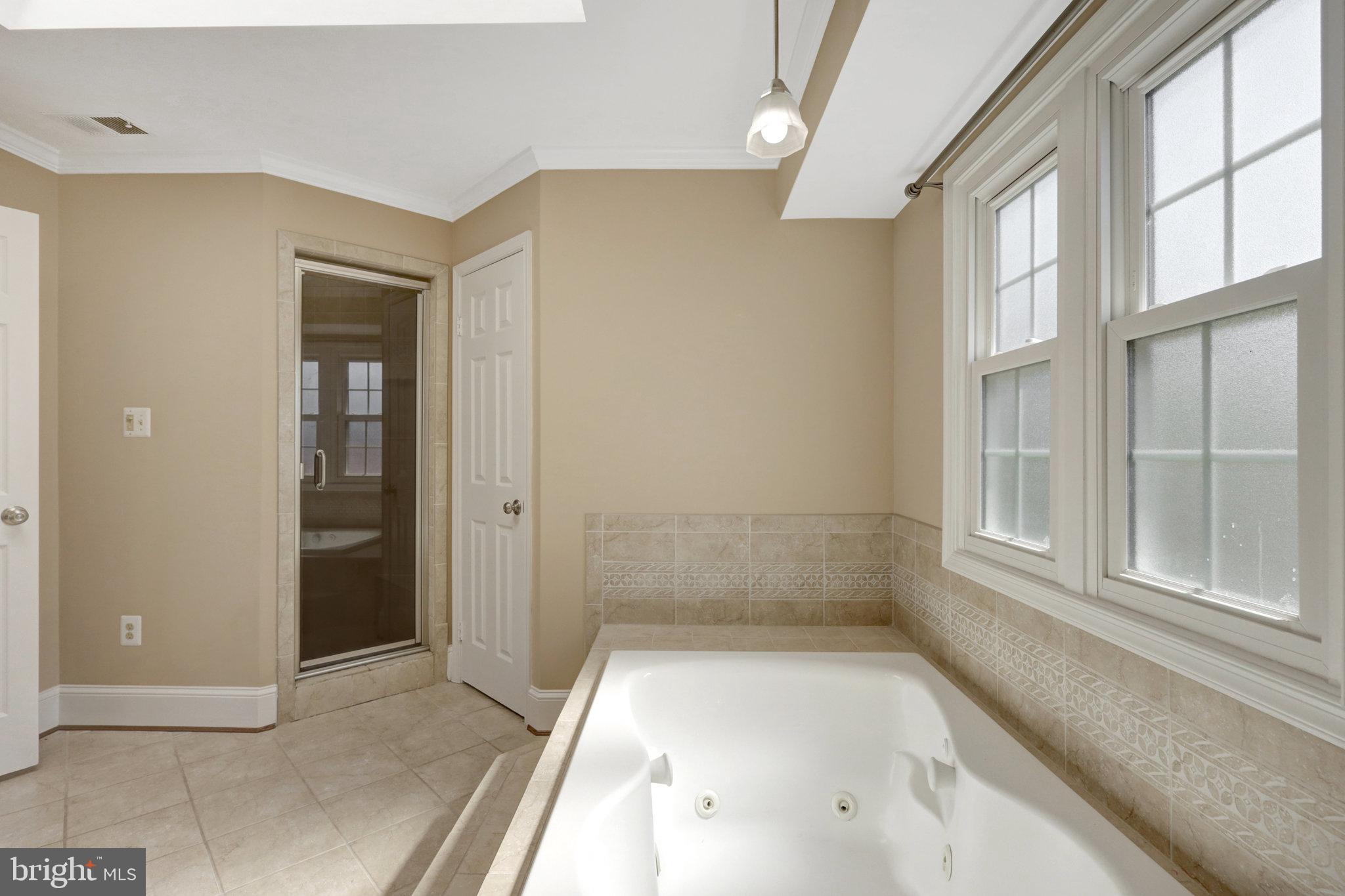 8497 Silverview Drive Lorton, VA 22079 - Photo 35 of 50 an empty room with windows