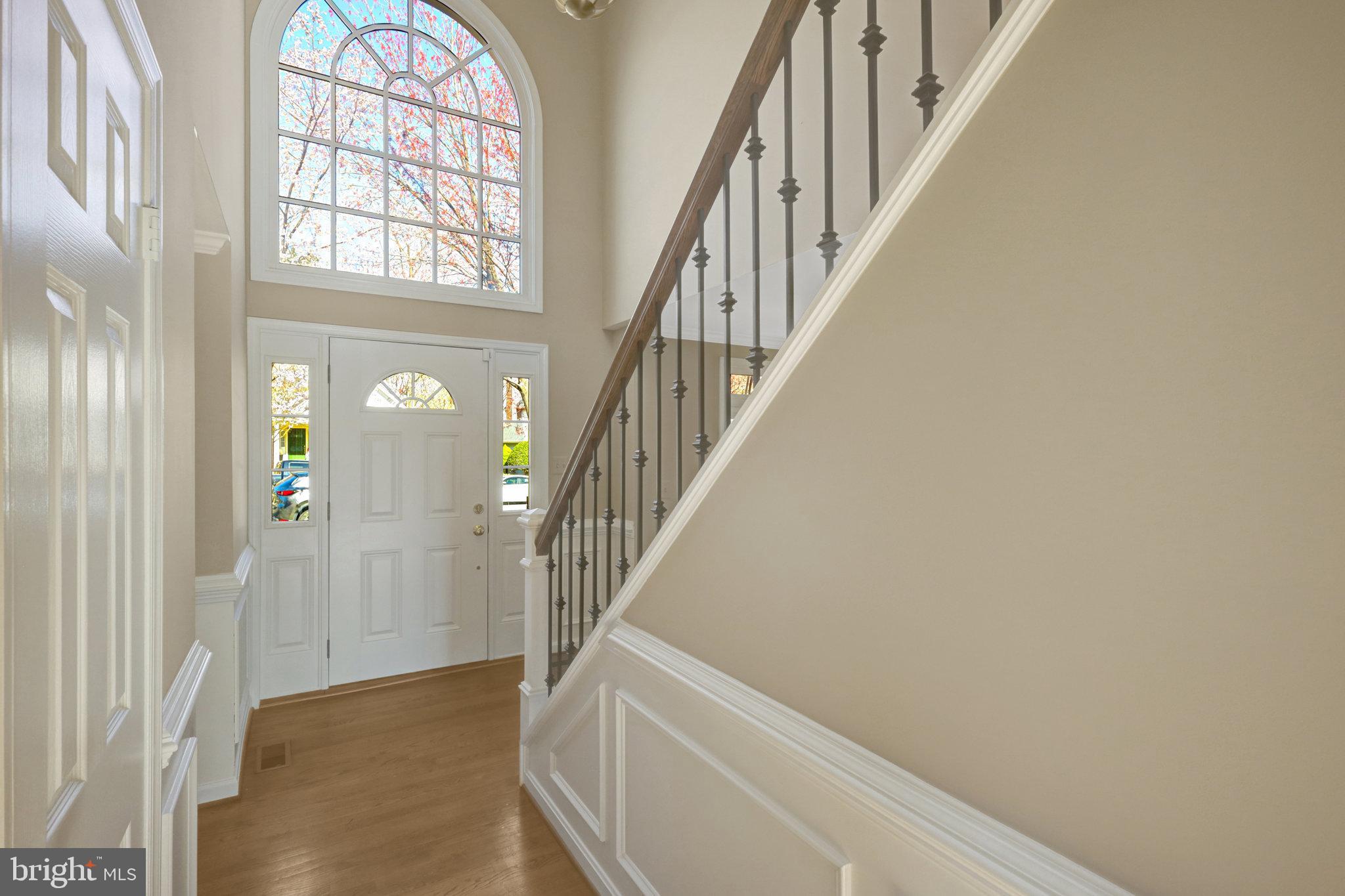 8497 Silverview Drive Lorton, VA 22079 - Photo 5 of 50 a view of an entryway with wooden floor