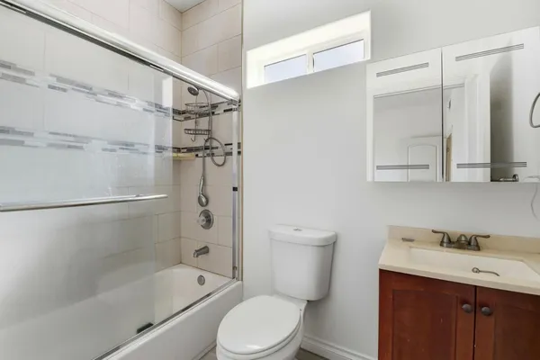 a view of a hallway with washer and dryer