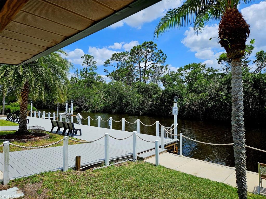 71 Sturbridge Lane Fort Myers, FL 33908 - Photo 7 of 14 a view of a chairs and table in the patio