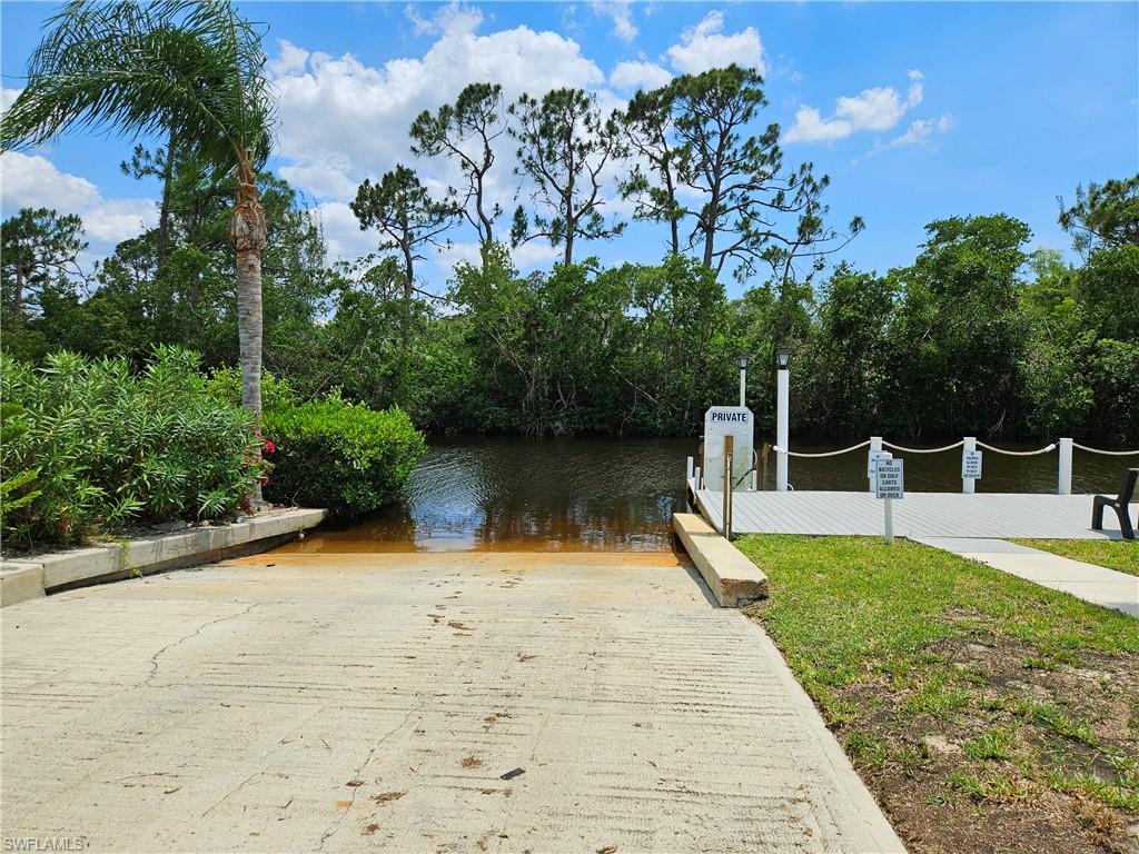 71 Sturbridge Lane Fort Myers, FL 33908 - Photo 8 of 14 a park view with a bench