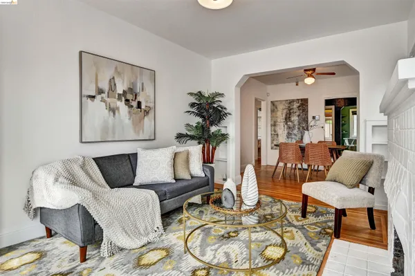 a living room with furniture a couch and a fireplace