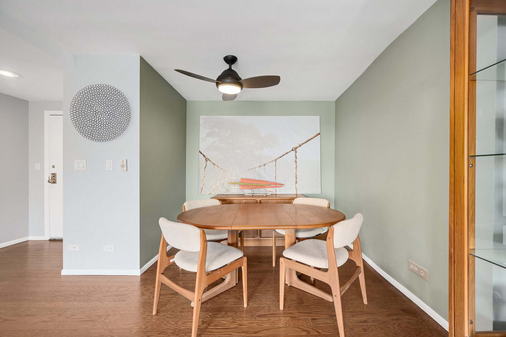 2000 St Regis Drive, Unit 6B Lombard, IL 60148 - Photo 12 of 32 a view of a dining room with furniture and wooden floor