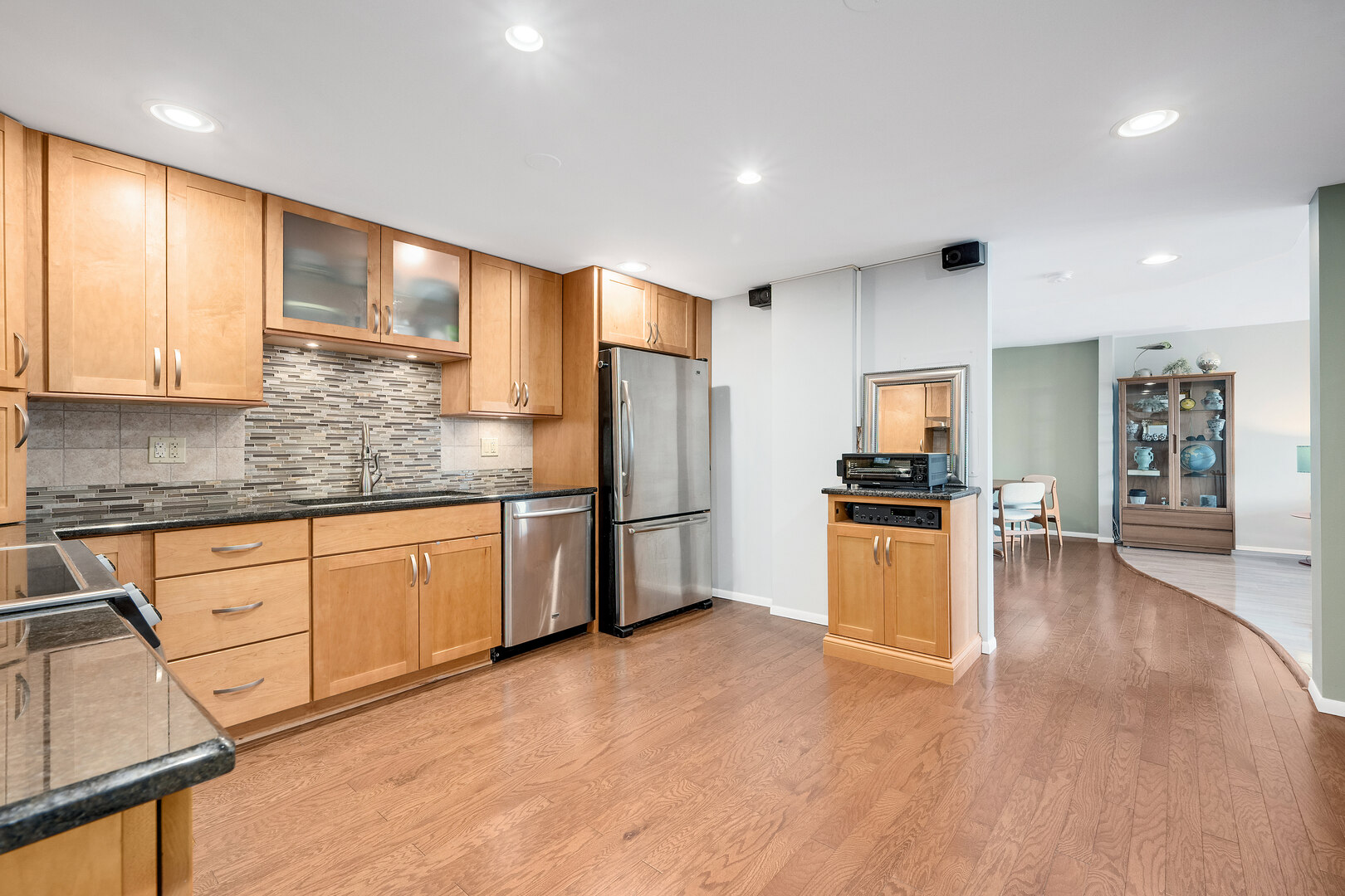 2000 St Regis Drive, Unit 6B Lombard, IL 60148 - Photo 13 of 32 a kitchen with stainless steel appliances a refrigerator sink and cabinets