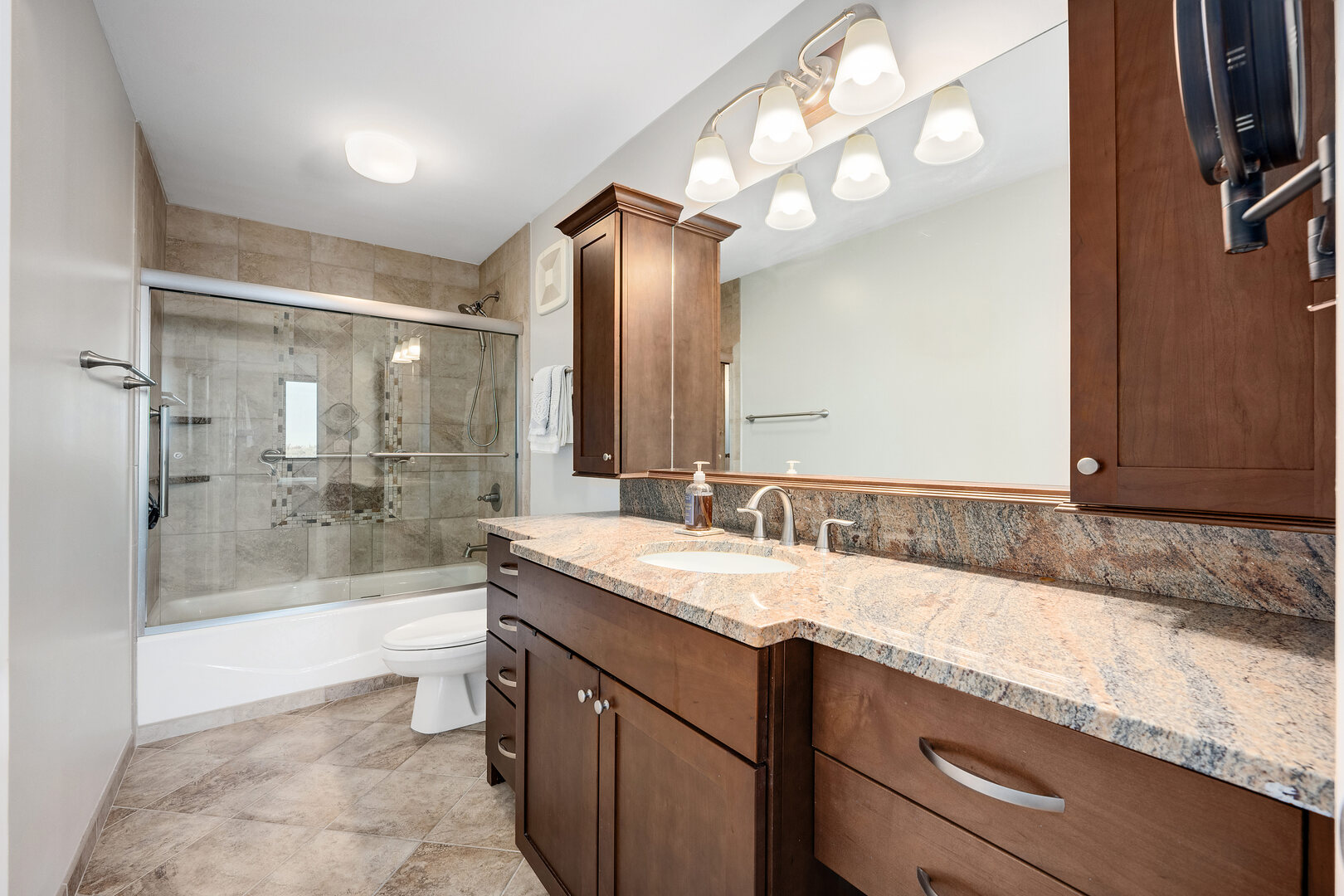 2000 St Regis Drive, Unit 6B Lombard, IL 60148 - Photo 17 of 32 a bathroom with a granite countertop sink mirror and bathtub