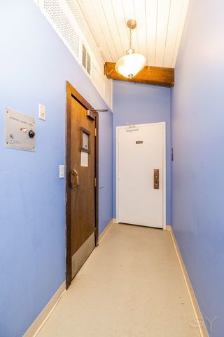 2000 St Regis Drive, Unit 6B Lombard, IL 60148 - Photo 25 of 32 a view of a hallway with closet