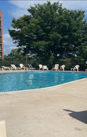 2000 St Regis Drive, Unit 6B Lombard, IL 60148 - Photo 29 of 32 front view of a house with a yard