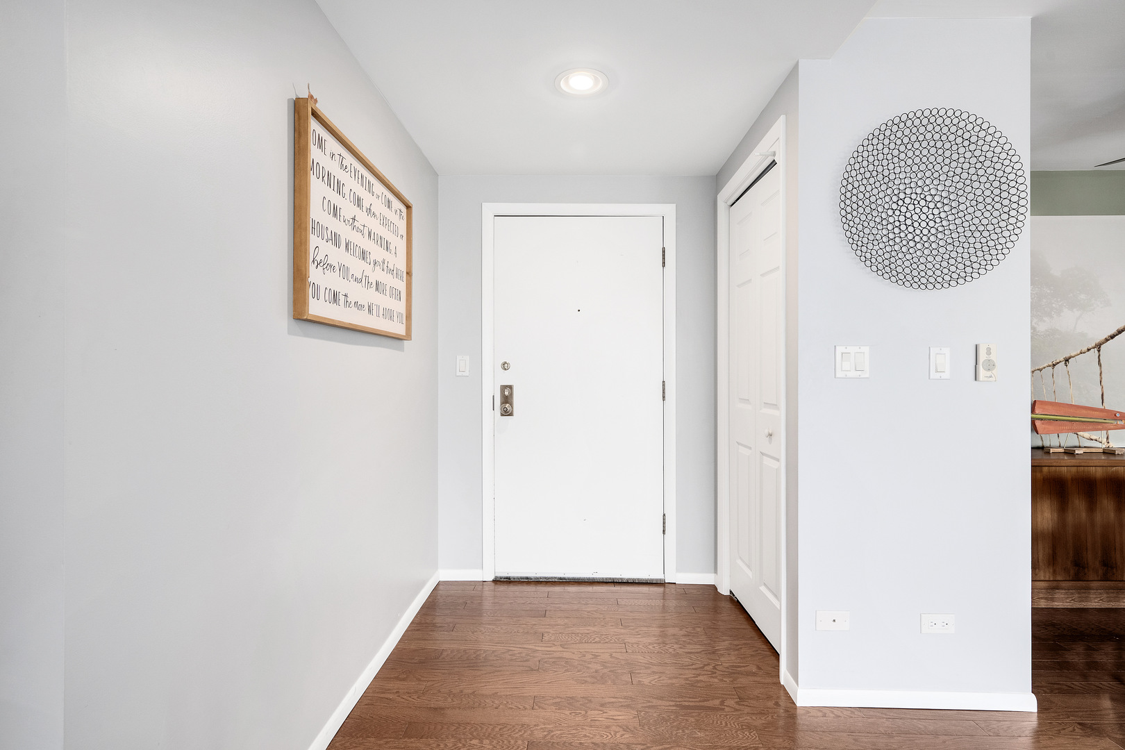 2000 St Regis Drive, Unit 6B Lombard, IL 60148 - Photo 8 of 32 a view of a room with wooden floor and a bathroom