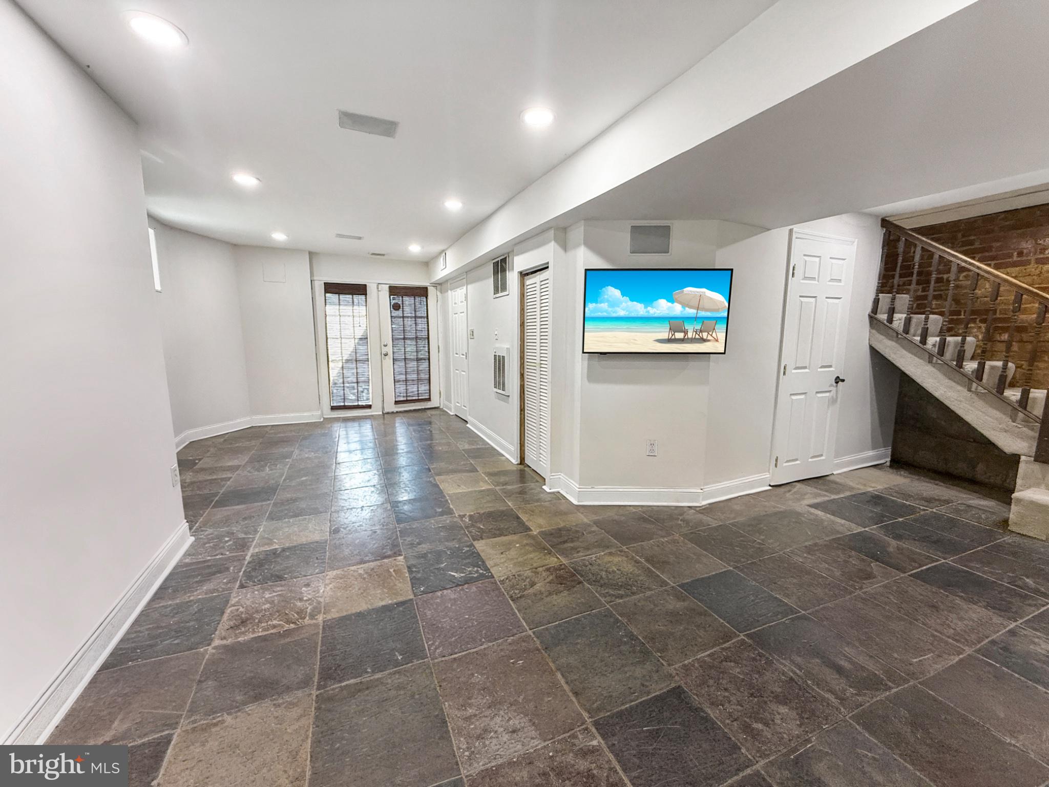 3216 18th Street Northeast Washington, DC 20018 - Photo 42 of 47 Spacious, modern basement retreat.