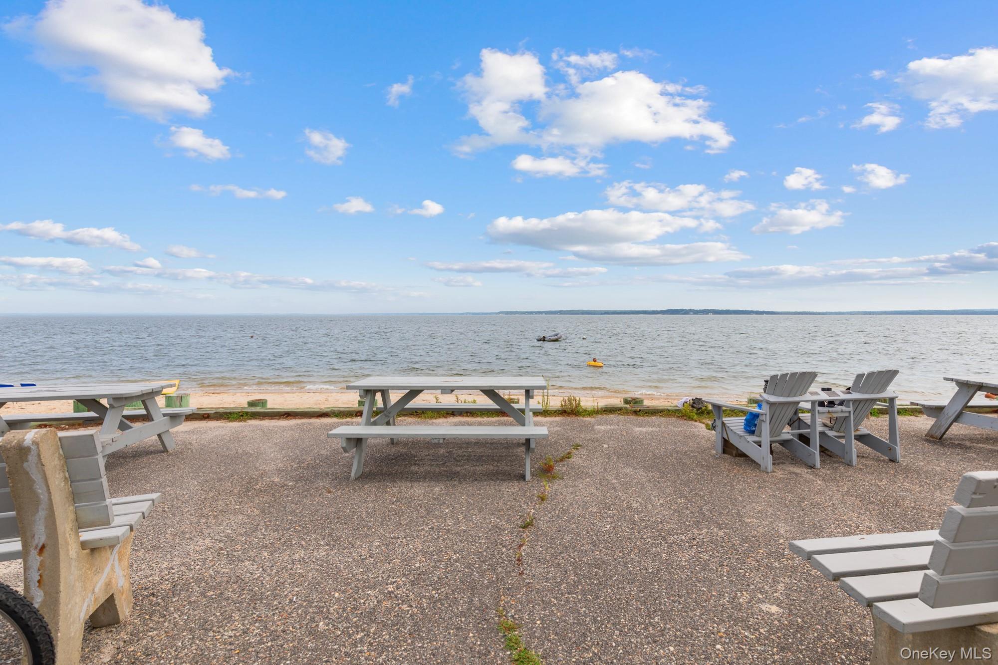 64 Point Street South Jamesport, NY 11970 - Photo 26 of 29 a view of a terrace with chairs