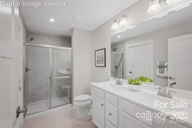 997 Pemberley Street, Unit 3177 Lancaster, SC 29720 - Photo 8 of 12 a spacious bathroom with a shower sink vanity mirror and toilet