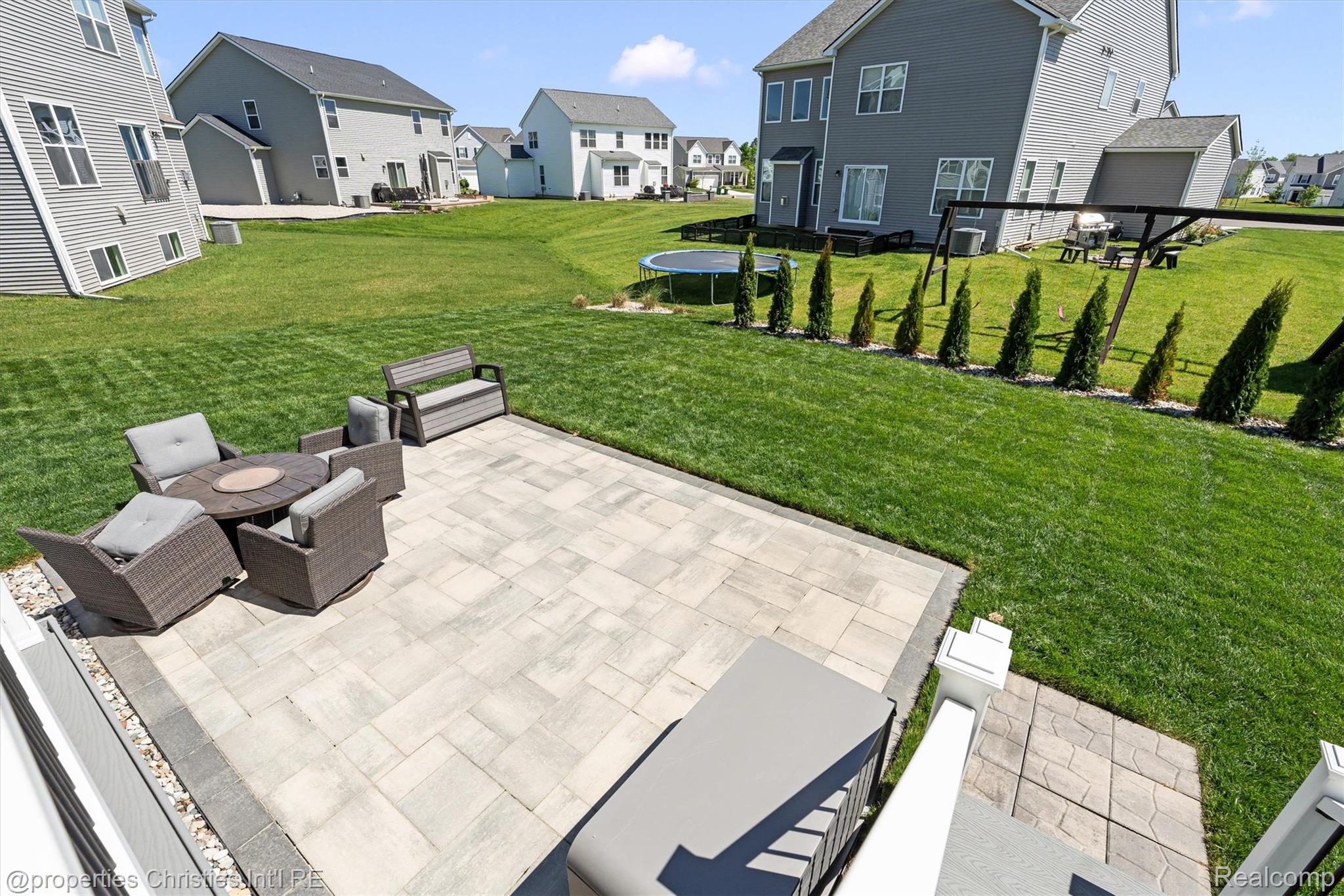 2721 Maize Loop Saline, MI 48176 - Photo 44 of 52 View of patio / terrace featuring a residential view and a trampoline