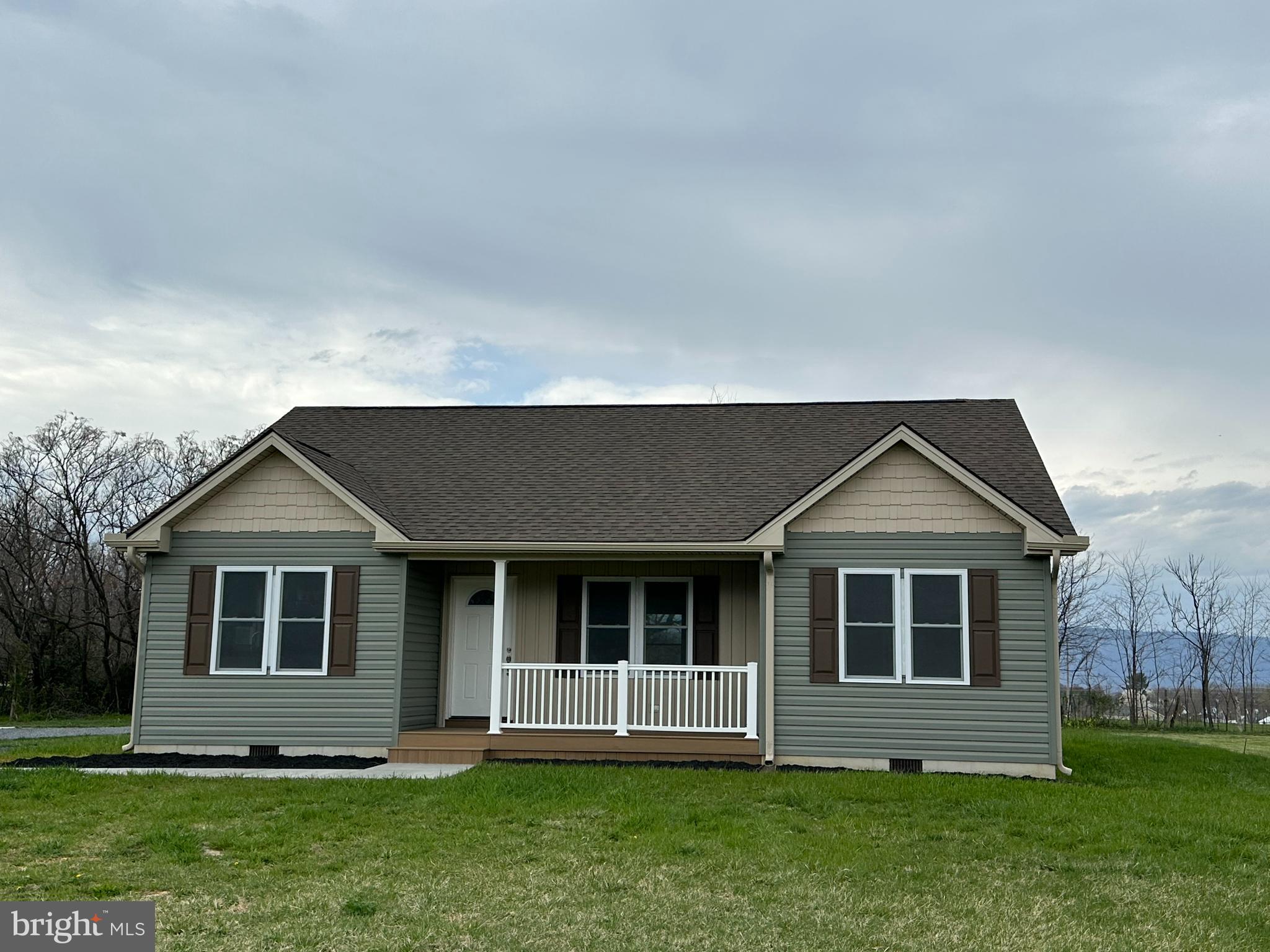 218 Honeyville Road Stanley, VA 22851 - Photo 1 of 27 a front view of a house with a yard