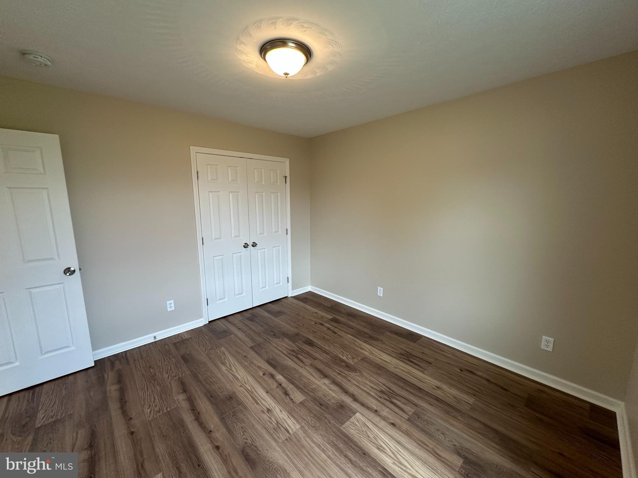 218 Honeyville Road Stanley, VA 22851 - Photo 17 of 27 a view of empty room with wooden floor