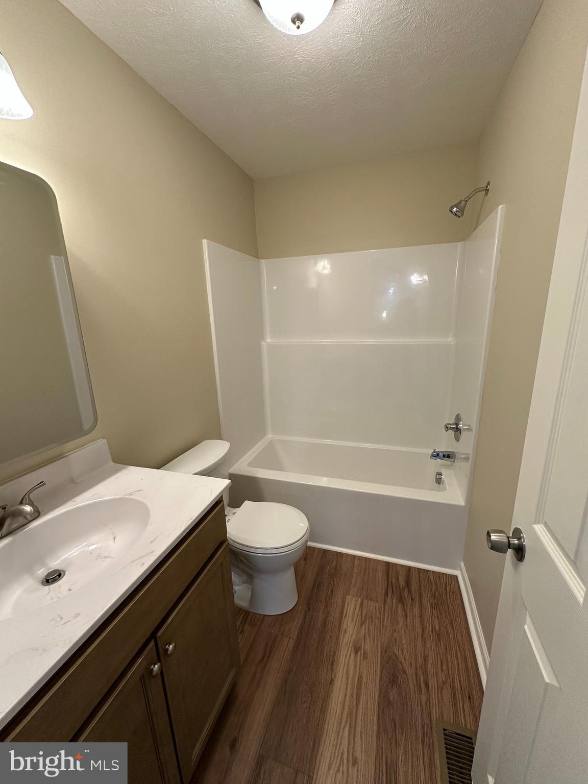 218 Honeyville Road Stanley, VA 22851 - Photo 19 of 27 a bathroom with a sink a toilet and shower