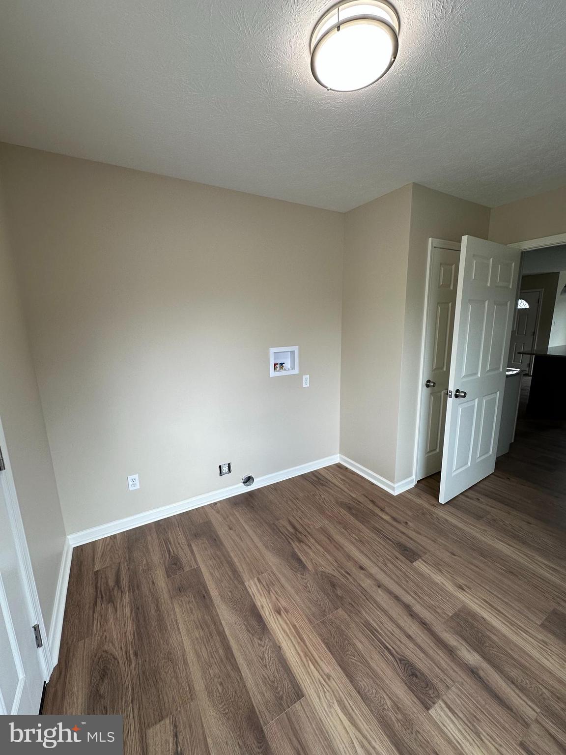 218 Honeyville Road Stanley, VA 22851 - Photo 23 of 27 an empty room with wooden floor and windows