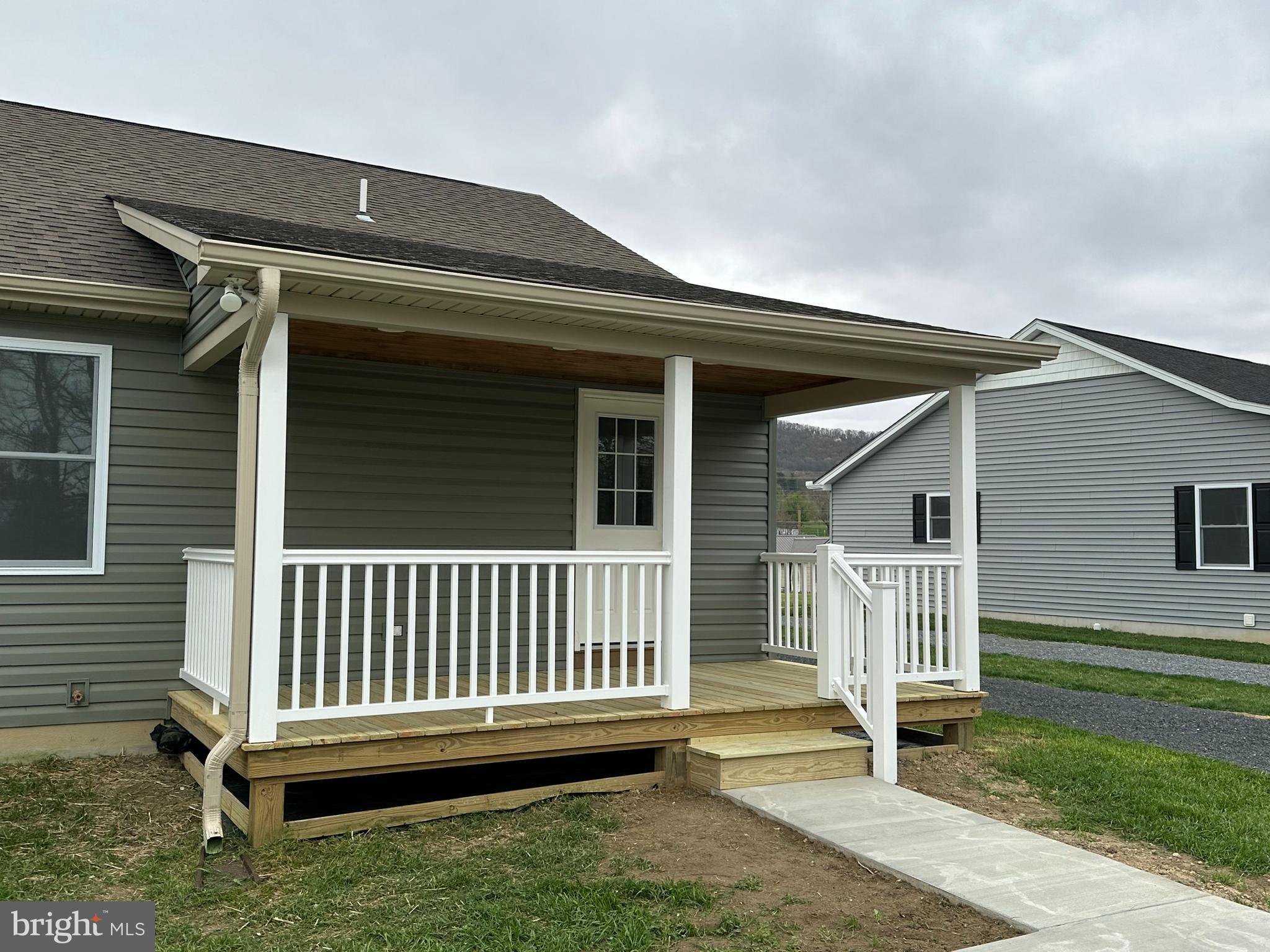 218 Honeyville Road Stanley, VA 22851 - Photo 26 of 27 a backyard of a house with a deck