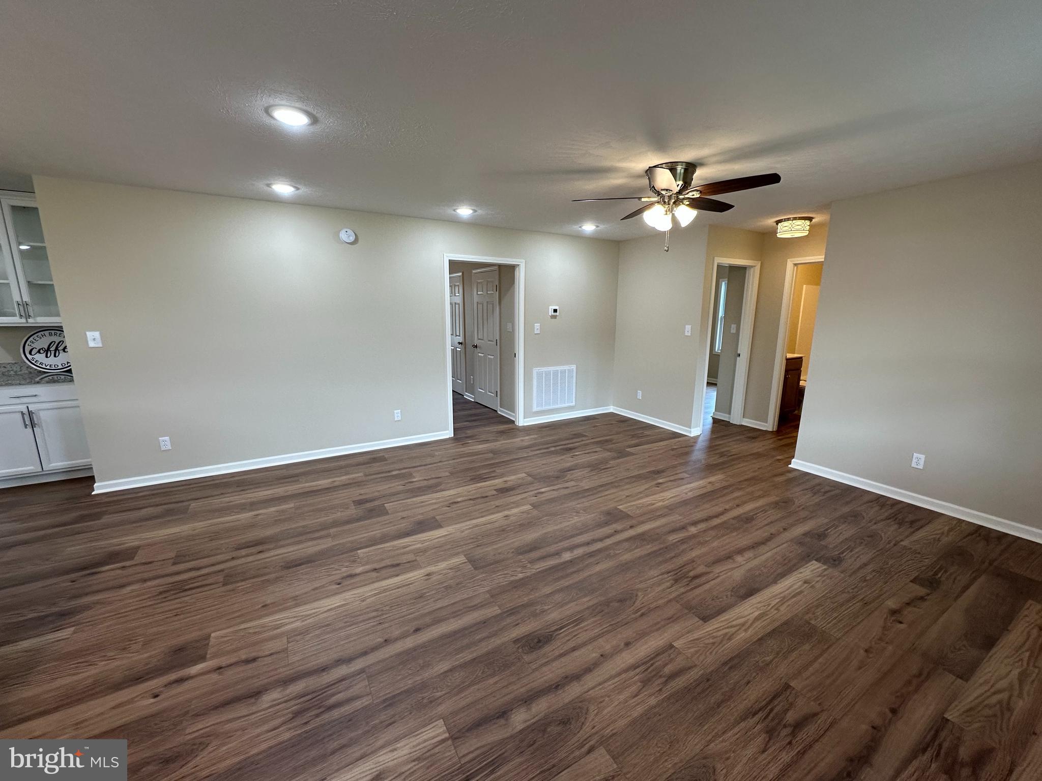 218 Honeyville Road Stanley, VA 22851 - Photo 4 of 27 a view of empty room with wooden floor