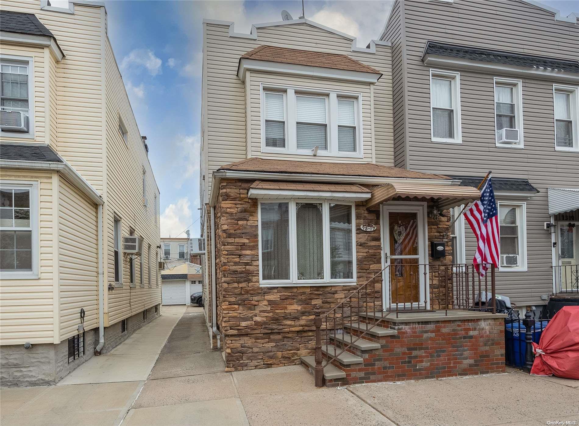 73-17 71st Place Queens, NY 11385 - Photo 1 of 1 Semi attached w/driveway and detached garage