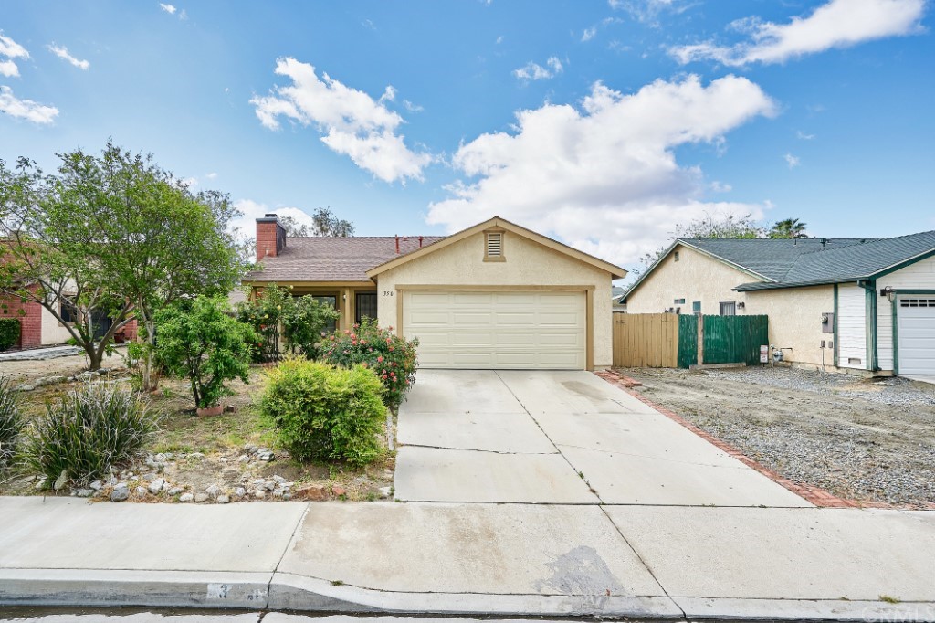 350 Quandt Ranch Road San Jacinto, CA 92583 - Photo 1 of 1 a view of a house with a yard and potted plants