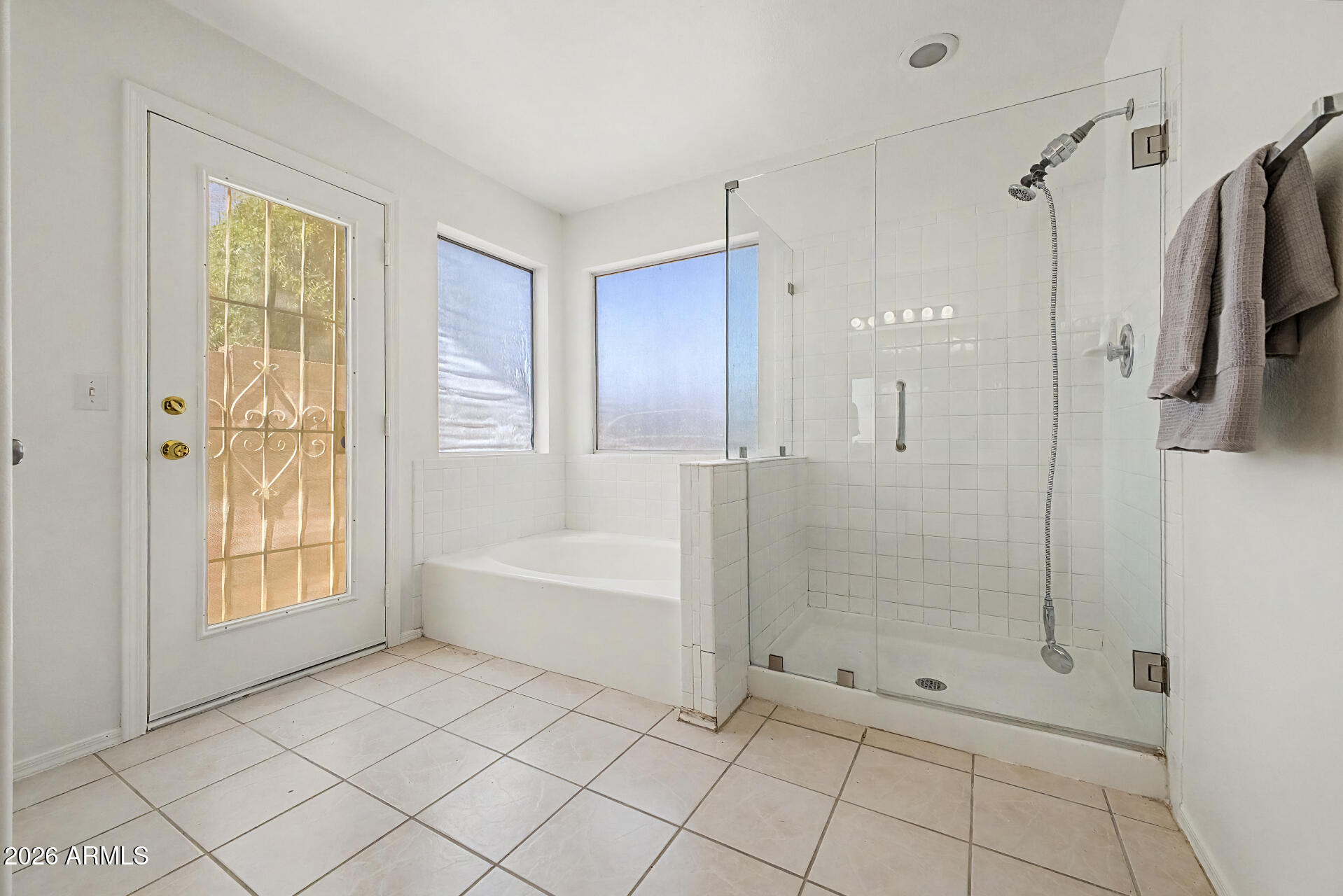 2762 North Ricardo Mesa, AZ 85215 - Photo 26 of 38 a bathroom with a bathtub and a shower