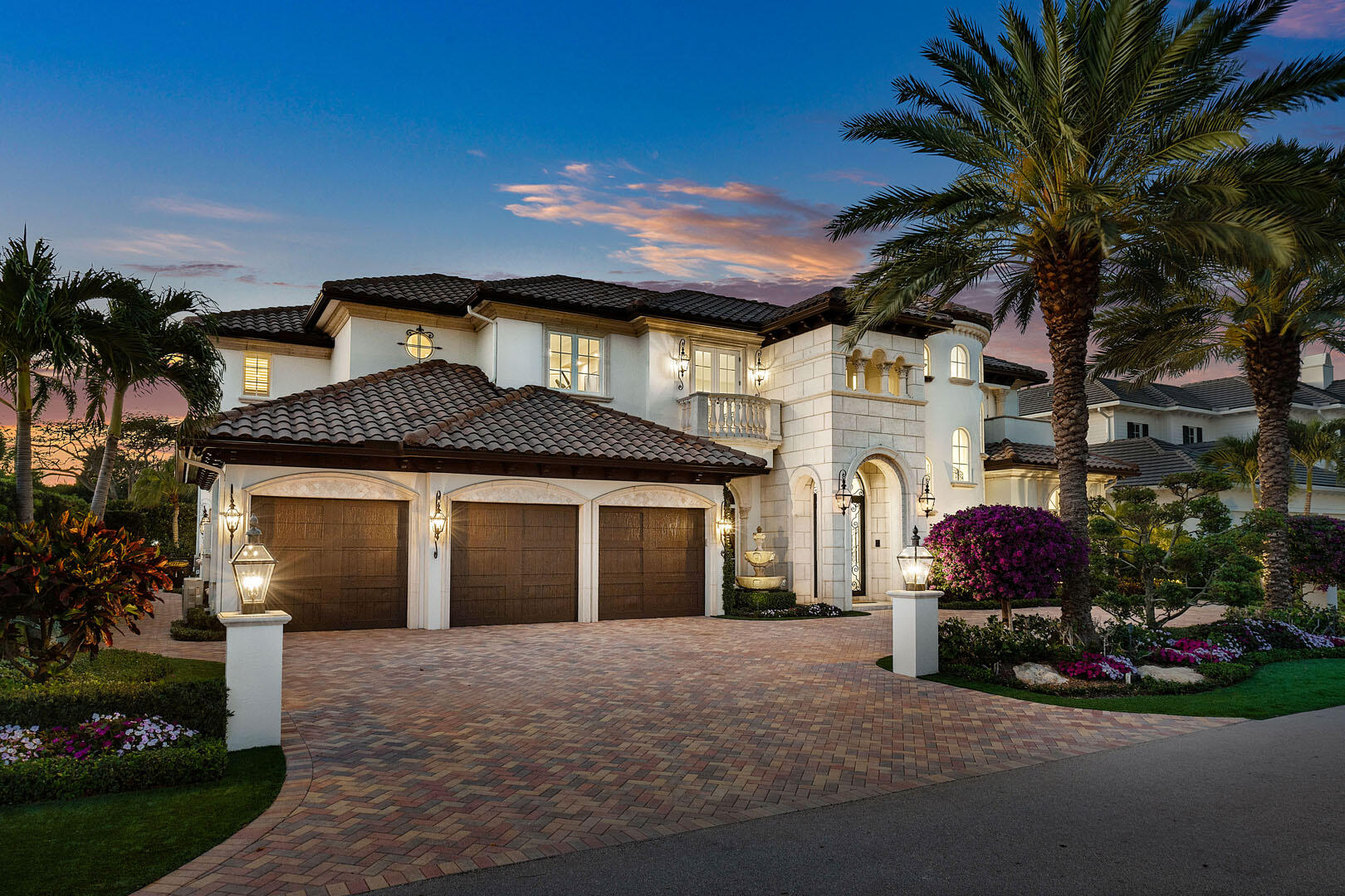 1801 Thatch Palm Drive Boca Raton, FL 33432 - Photo 3 of 53 1801_Thatch_Palm_Drive_Dusk_01