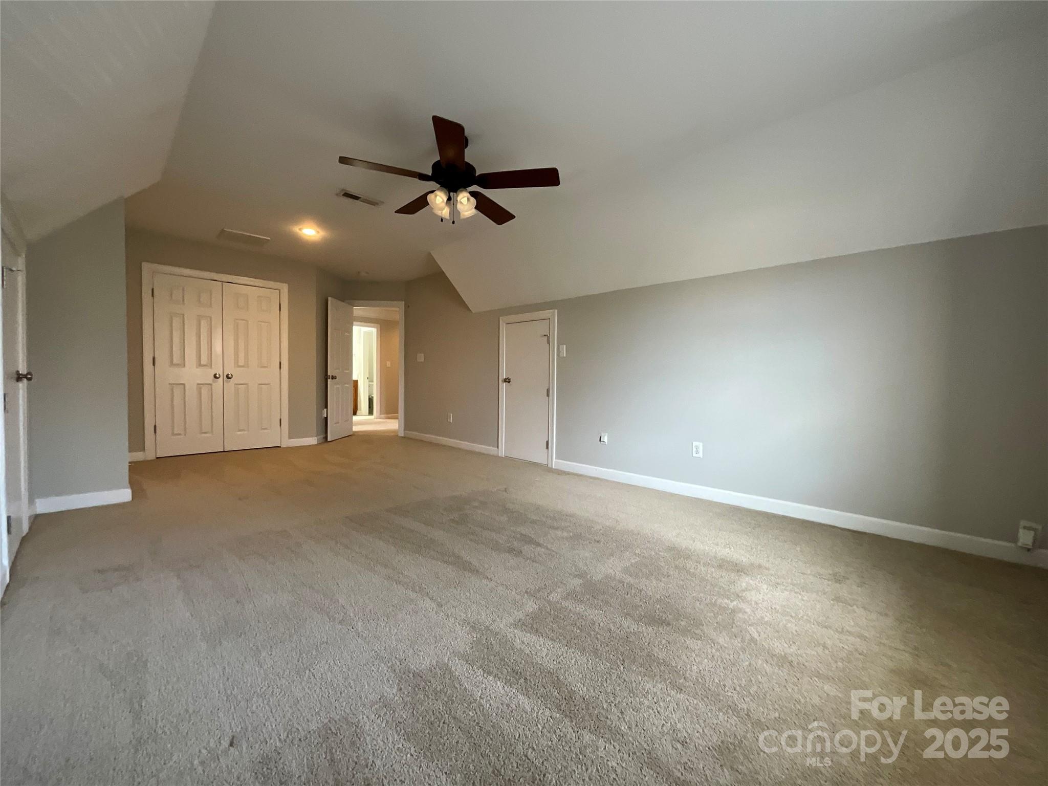 3100 Sea Island Lane Harrisburg, NC 28075 - Photo 22 of 30 a view of a livingroom with a ceiling fan and window