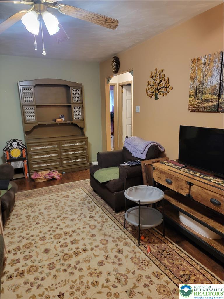 320 Hillside Street Forest City, PA 18421 - Photo 17 of 24 a living room with furniture and a flat screen tv