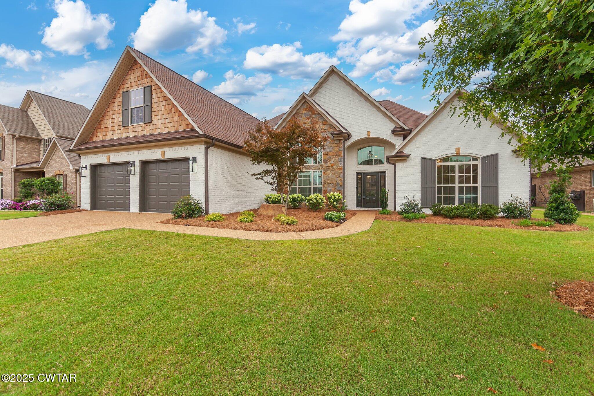 24 Joseph Cove Jackson, TN 38305 - Photo 18 of 37 a front view of house with yard and green space