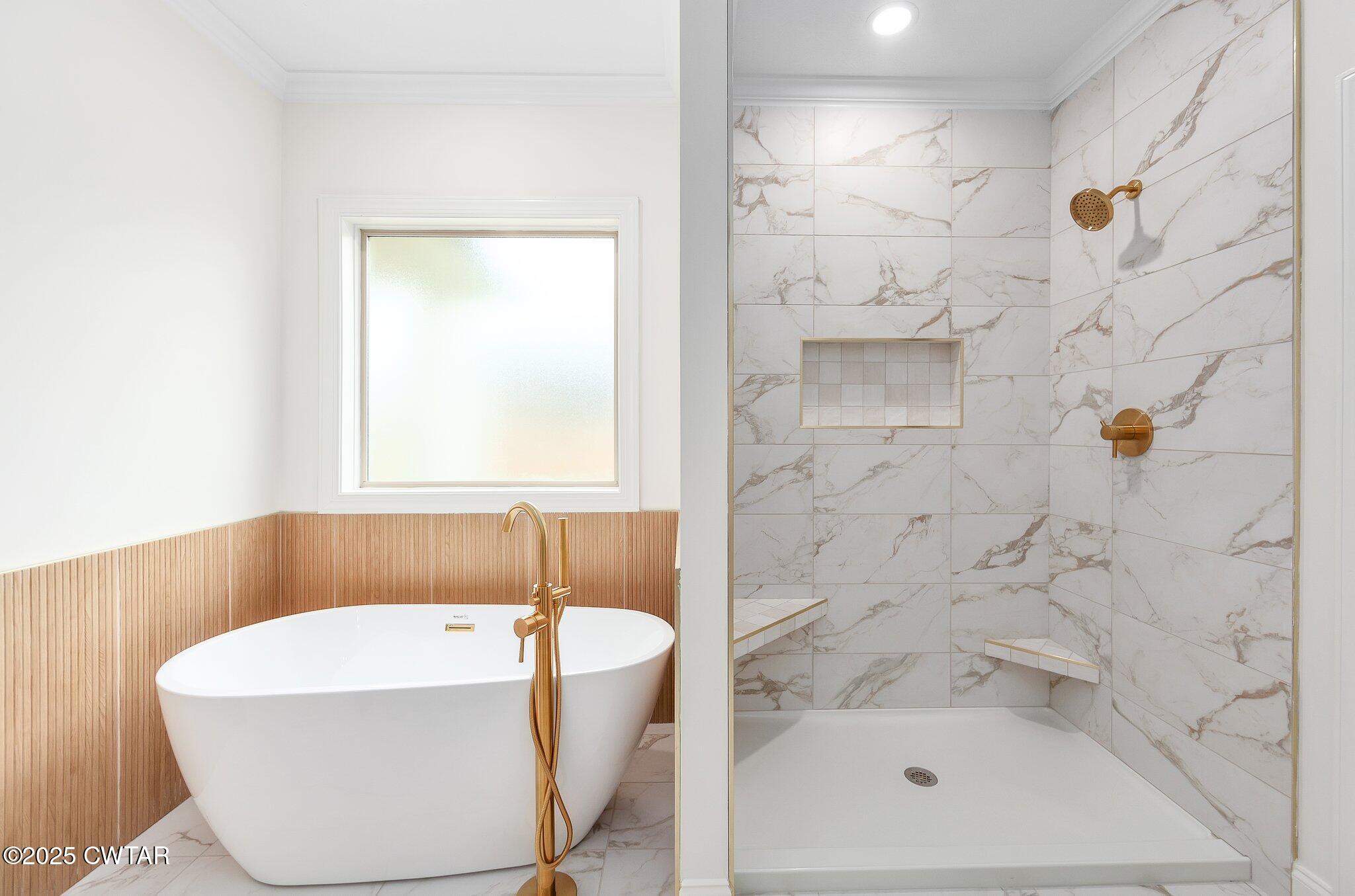 24 Joseph Cove Jackson, TN 38305 - Photo 19 of 37 a white bath tub sitting next to a shower