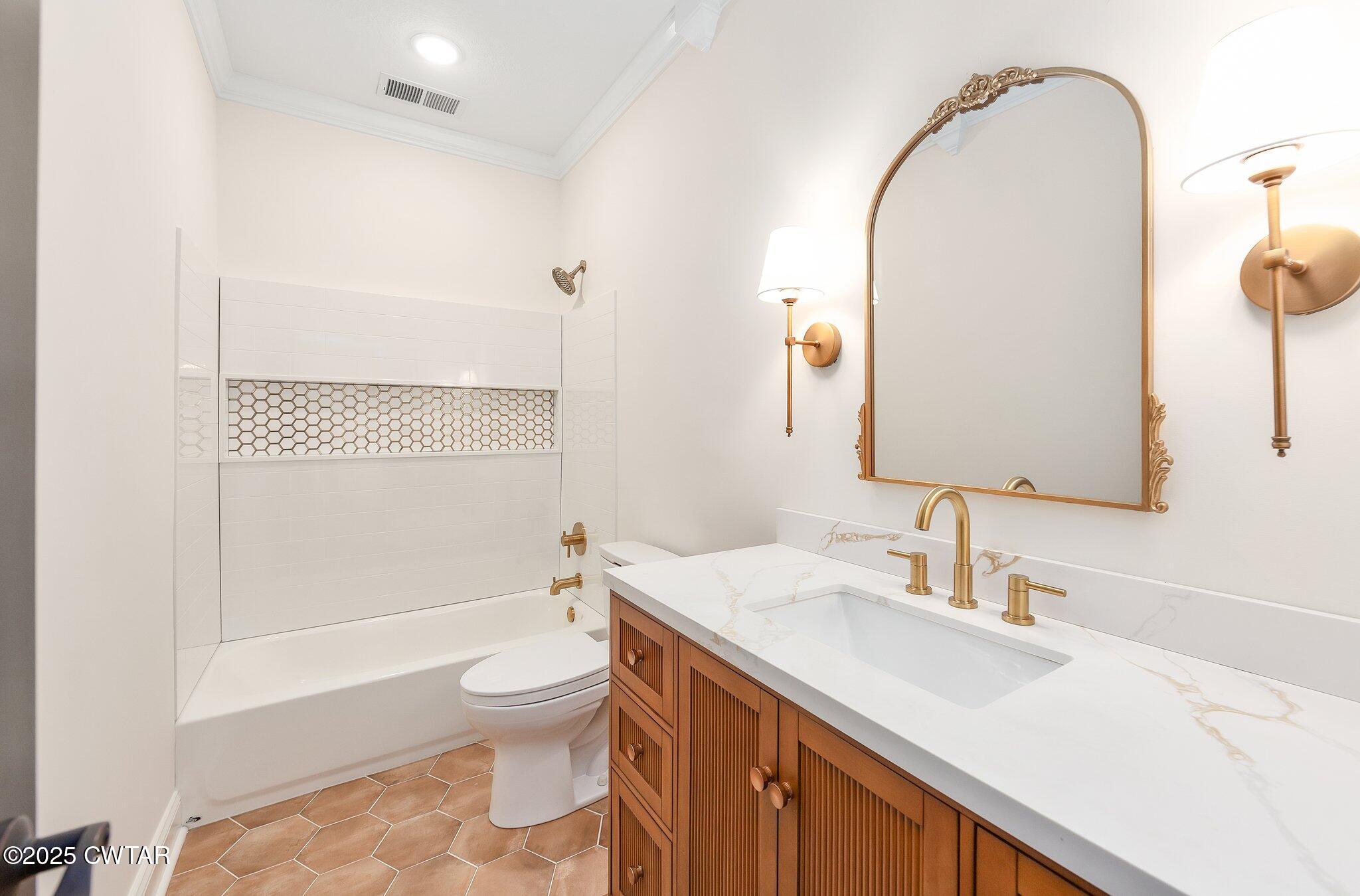 24 Joseph Cove Jackson, TN 38305 - Photo 21 of 37 a bathroom with a sink a toilet and shower