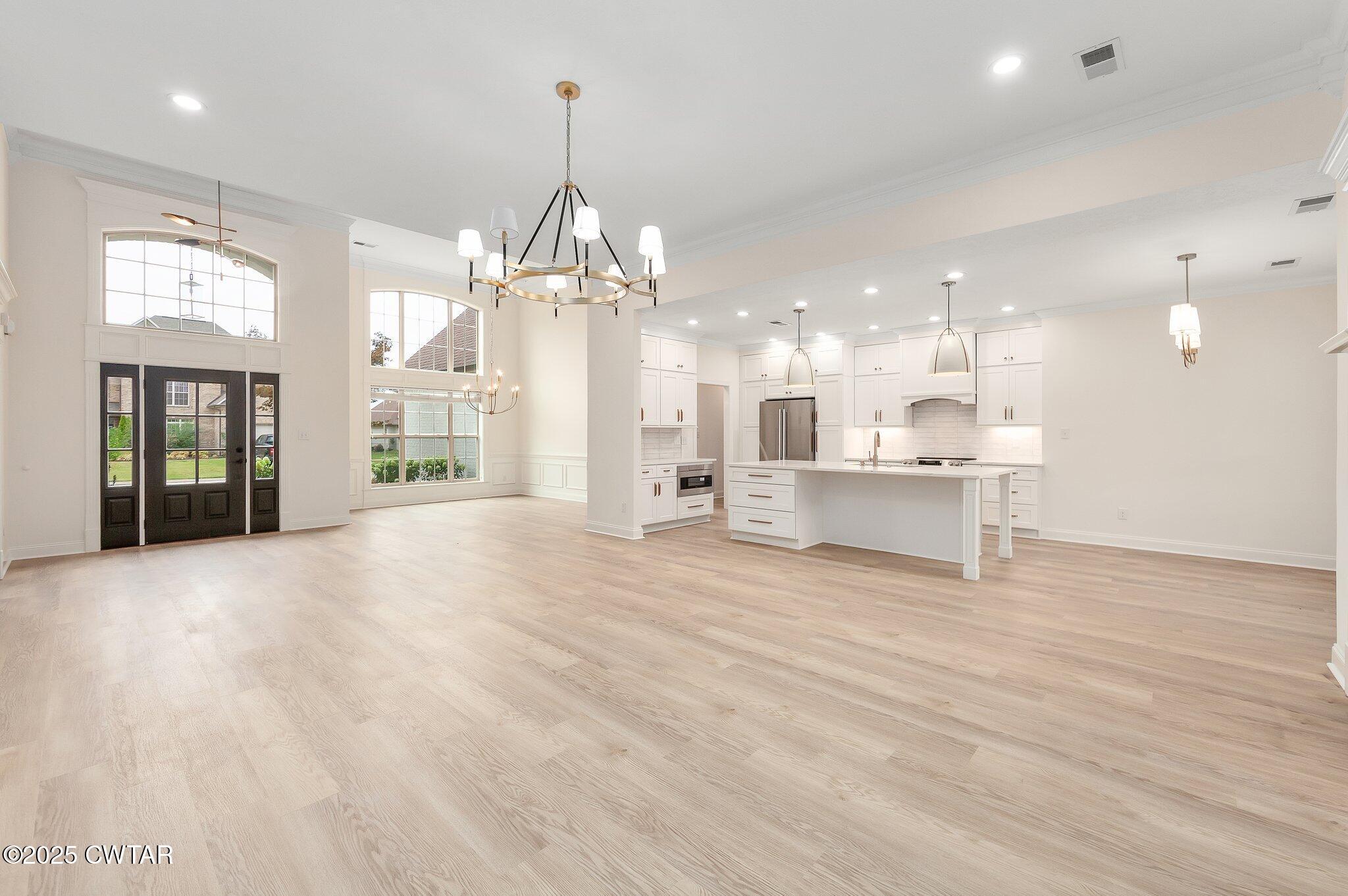 24 Joseph Cove Jackson, TN 38305 - Photo 37 of 37 a view of a kitchen with a sink and cabinet chandelier