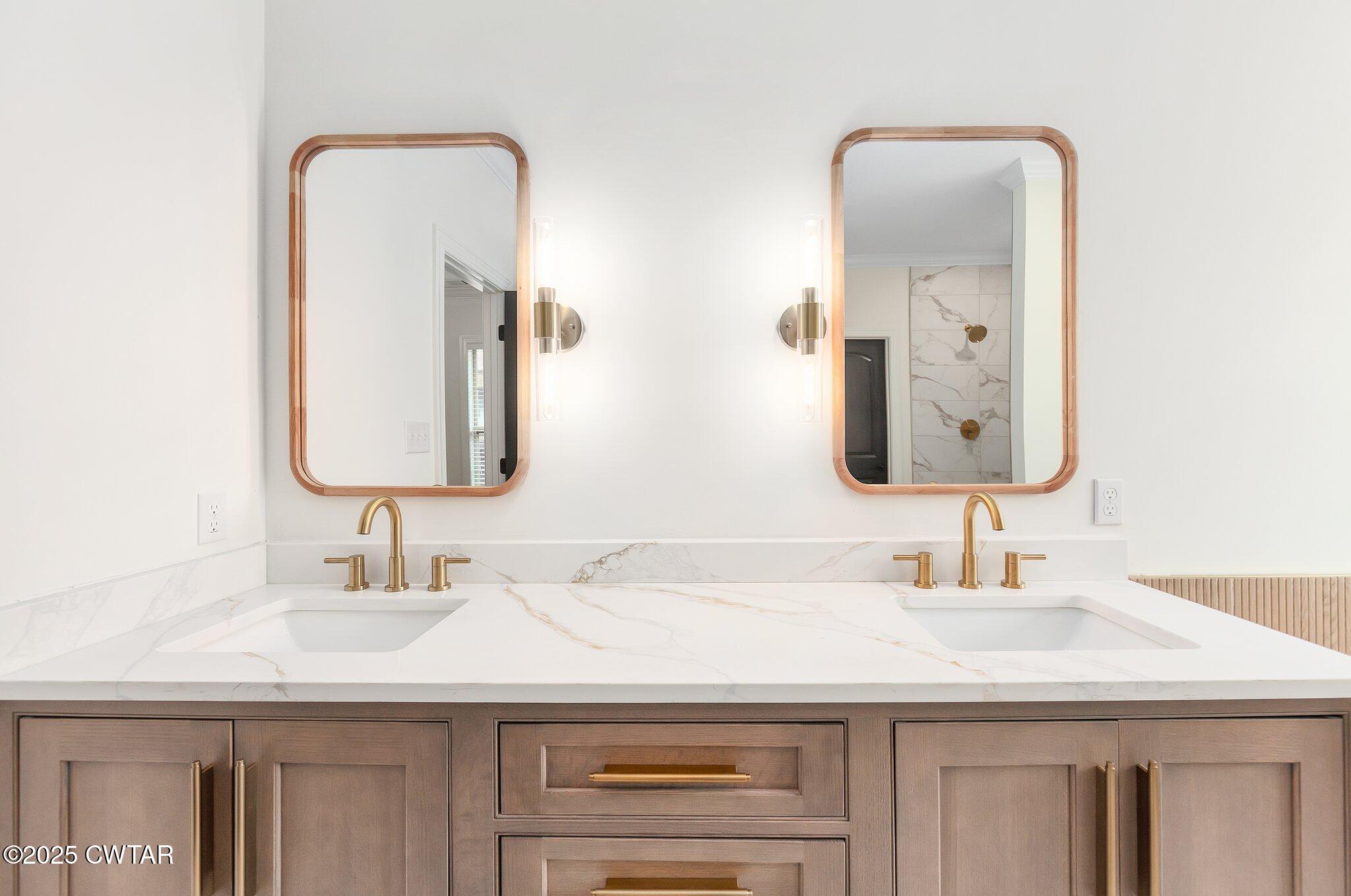 24 Joseph Cove Jackson, TN 38305 - Photo 29 of 37 a bathroom with double vanity sinks and a mirror