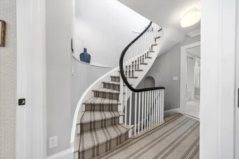 a view of entryway with wooden floor