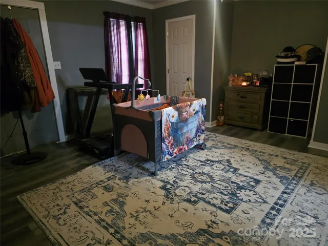 a view of a house with a yard porch and sitting area