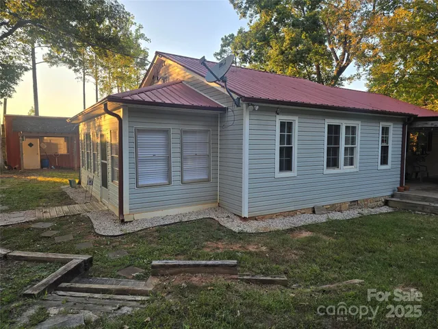 an aerial view of residential house with outdoor space
