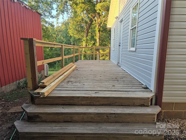 a view of a wooden fence
