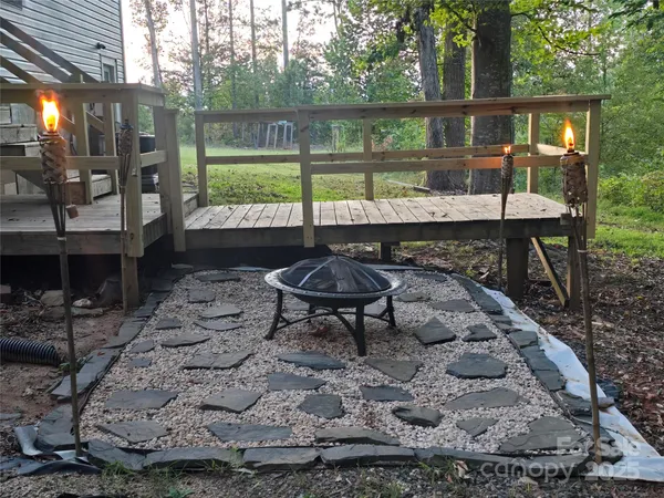 a view of a bench in a backyard