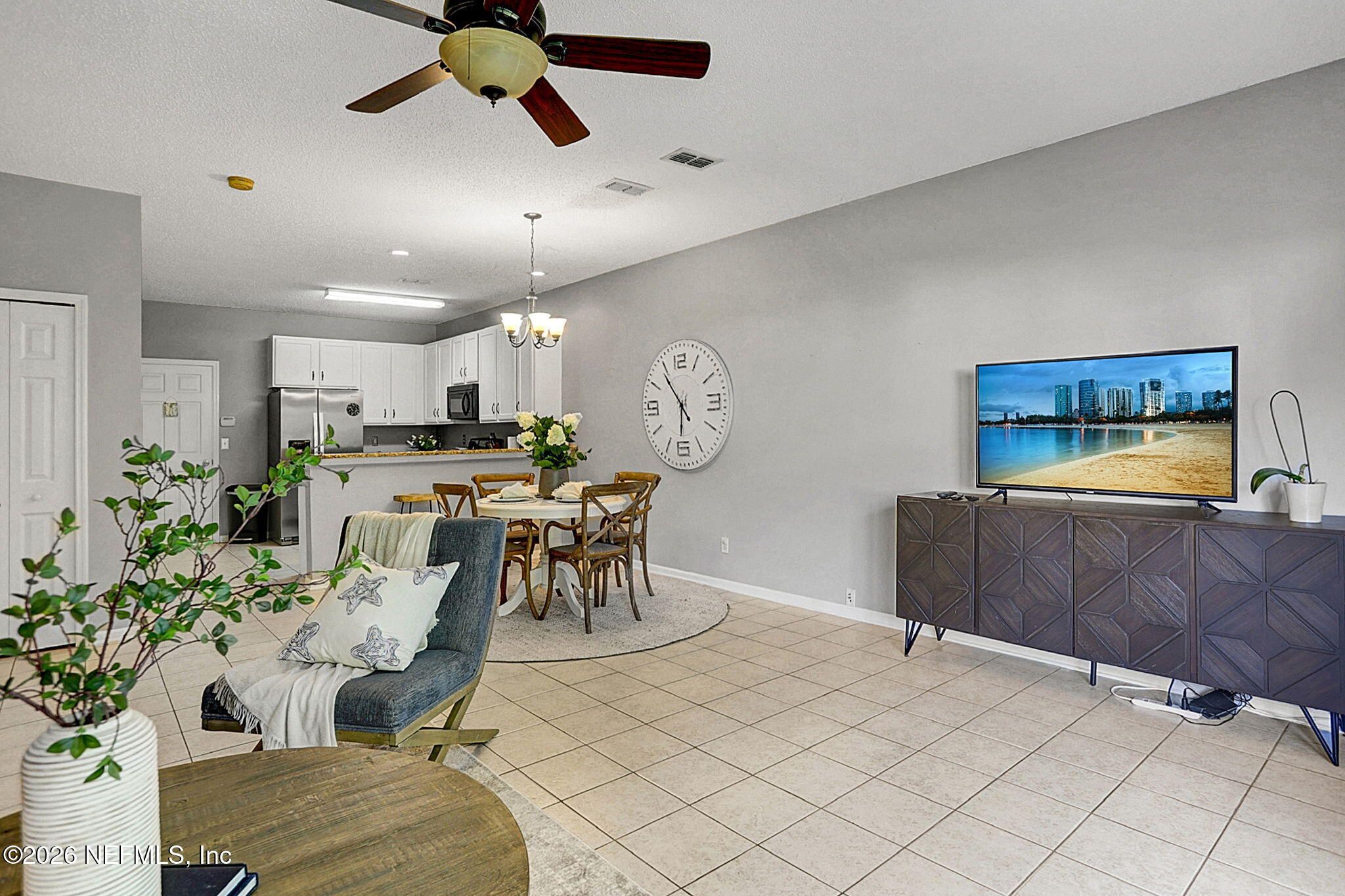 8629 Ribbon Falls Lane Jacksonville, FL 32244 - Photo 13 of 39 a living room with furniture and a large window