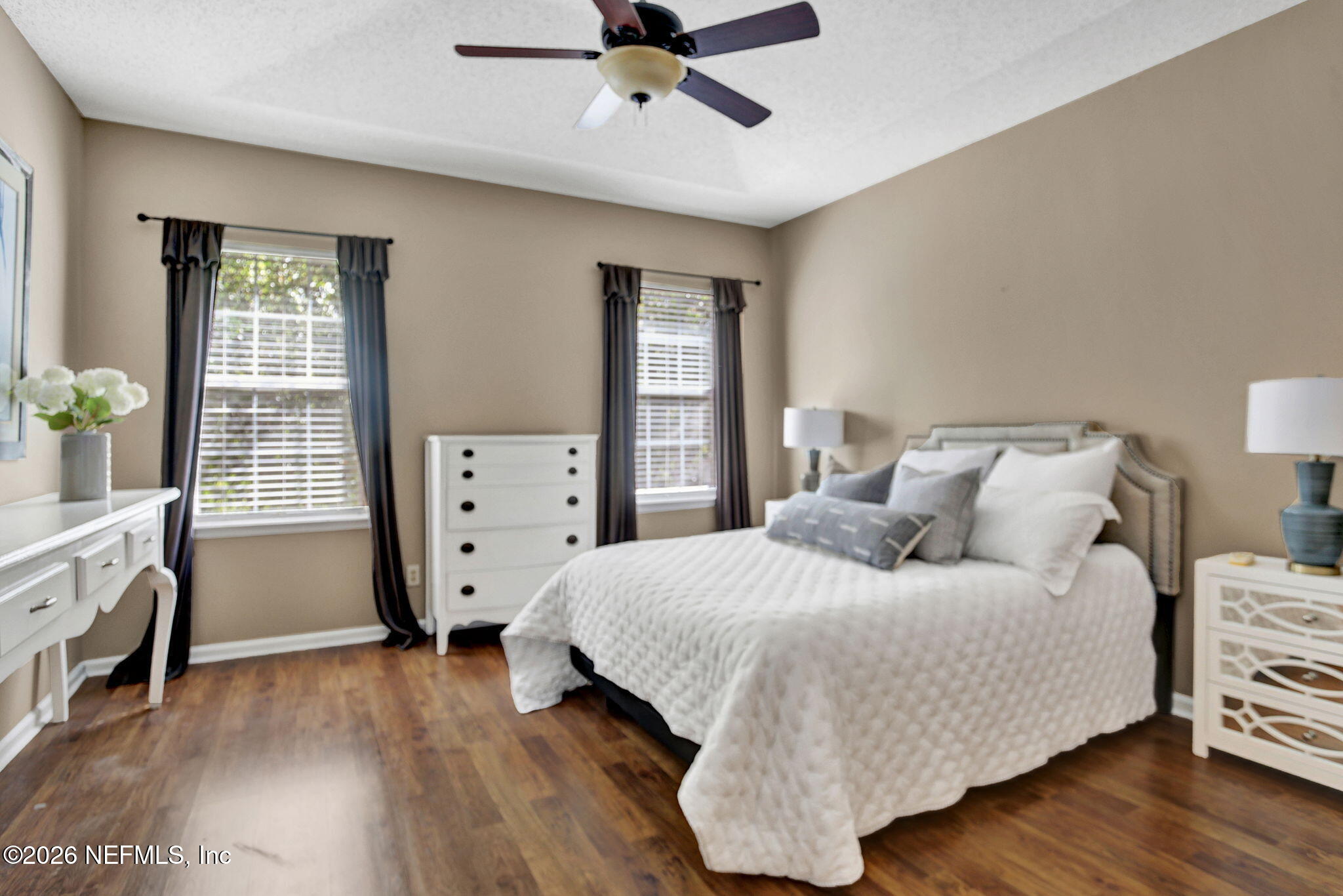 8629 Ribbon Falls Lane Jacksonville, FL 32244 - Photo 19 of 39 a bedroom with a bed and a window