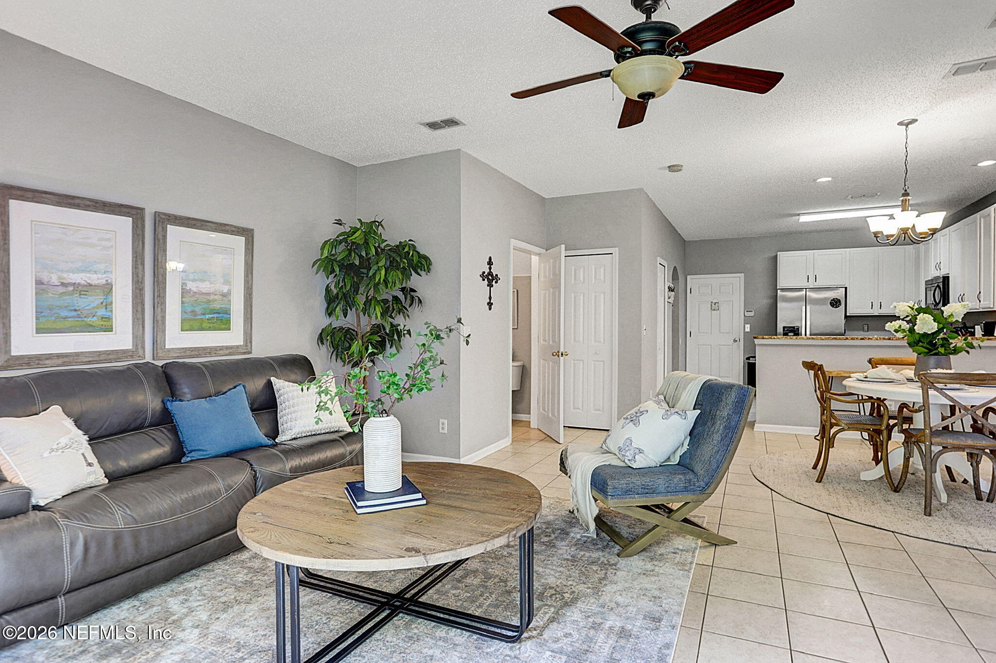 8629 Ribbon Falls Lane Jacksonville, FL 32244 - Photo 10 of 39 a living room with furniture and a window
