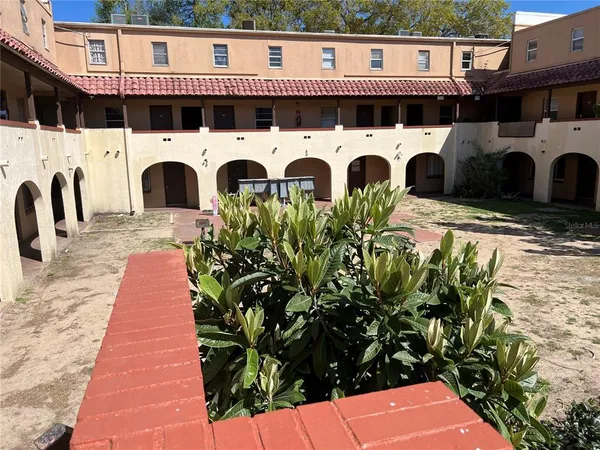 a cars parked in front of a building