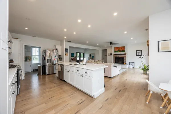 a kitchen with a cabinets and window