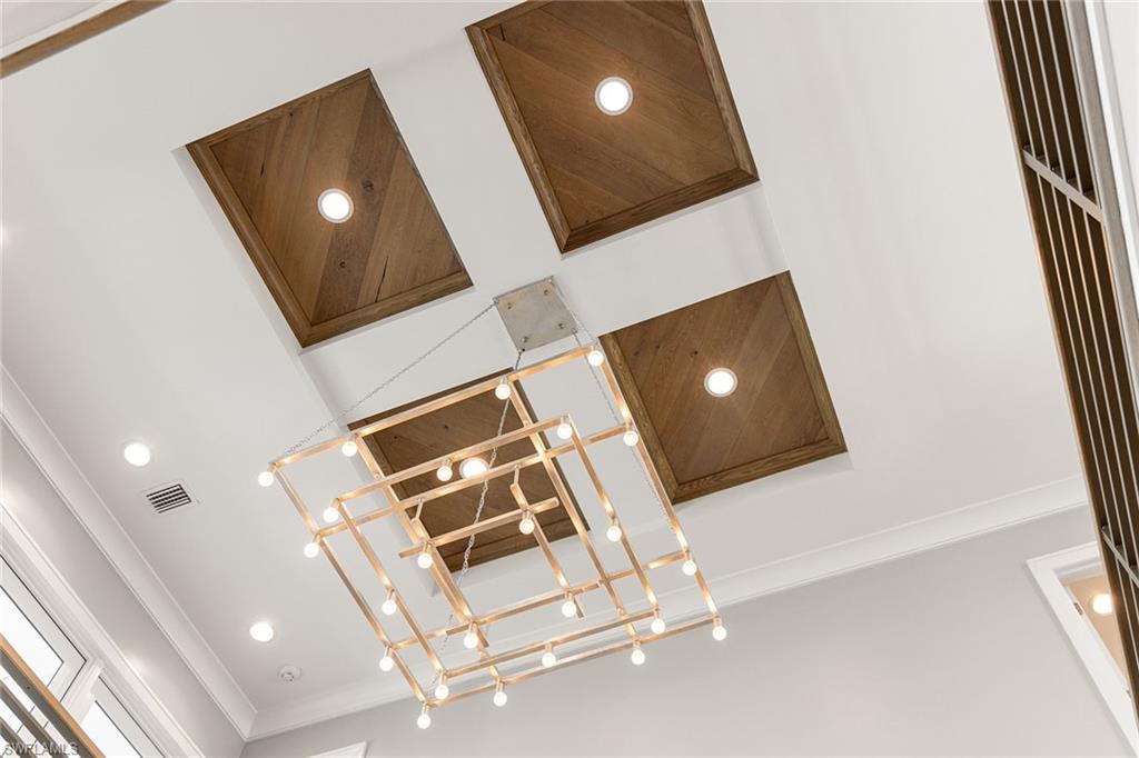 175 Conners Avenue Naples, FL 34108 - Photo 15 of 49 a living room with table and chairs